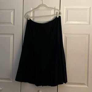 Talbots size 16 a line pleaded black skirt. Fully lined.